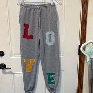 Woman’s Jr Miss Gray Sweatpants with Colorful Letter Patches